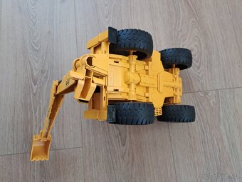 Bruder traktor bagr délka 30 cm - 6