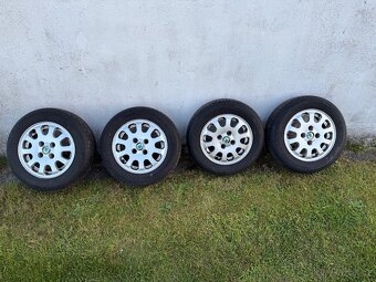 Alu disky 4x100 s gumou 165/70 r13 originál Felicia - 6