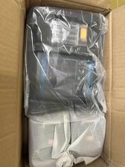 (543) Nabíječka + 2× baterie 18V 8. - 6