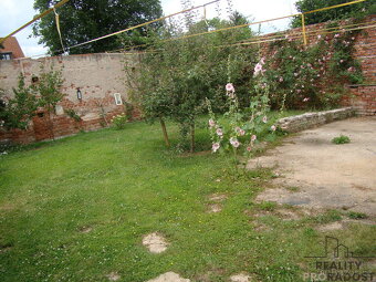 Prodej 1/3 rodinného domu se zahradou v Hořesedlích, RD ter - 6