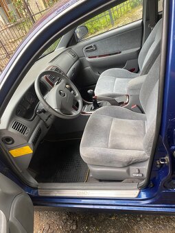Kia magentis v6 - 6