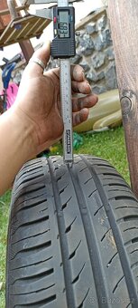 prodám 1 kus letní pneu Continental 185/55R14-020 - 6