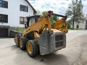 Kolový nakladač KOMATSU SK714 - 6