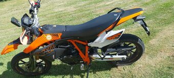 Yuki 125i SR - 6