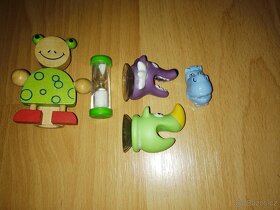 Hry pro děti: Štěňátka, dřevěná žirafa, krytky na kartáček - 6