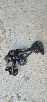 Přehazovače a páčky Sram, Shimano - 6