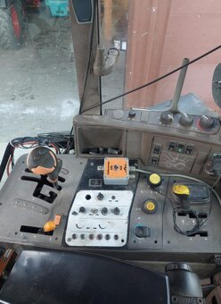 Lesní traktor JOHN DEERE 6930 - 6