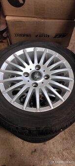 prodám pneu i s alu kolama original Ford - 6