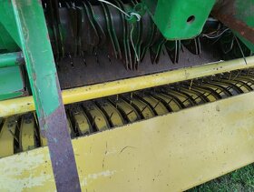 Svinovací lis John Deere 590 - 6