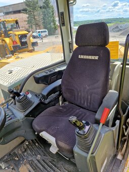 Kolové rypadlo LIEBHERR 311 kolový bagr LIEBHERR A311 - 6