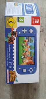 Nintendo Switch Lite Blue + originální krabice + pouzdro - 6