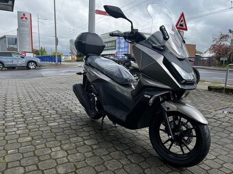 Kymco SkyTown 125 - 6