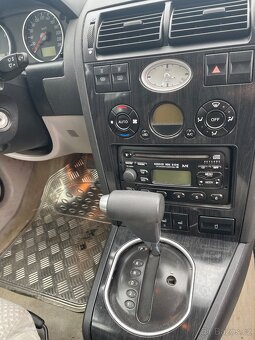 Ford Mondeo Ghia 2.0i 107 kw - automat - 6