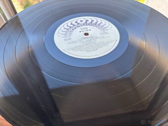 Yes - 90125. LP - 6