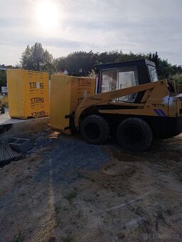 Smykový nakladač CATERPILLAR - 6