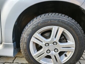 Daihatsu sirion 1,3i 64 kw - 6