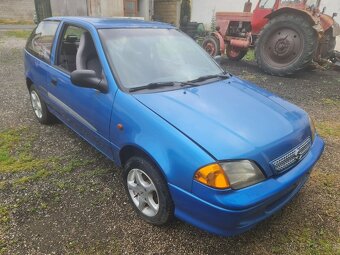 Suzuki Swift 1.0i, 39kW, 10/2001, klima - 6