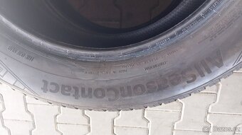 Prodám 2 x celoroční pneu Continental 235/55/18 - 6