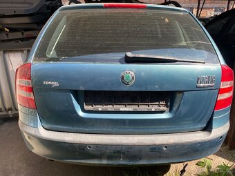 Octavia 2 facelift,1,6i,75KW,kód barvy 9598 - 6