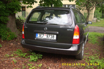 Opel astra caravan 1.8 - 6