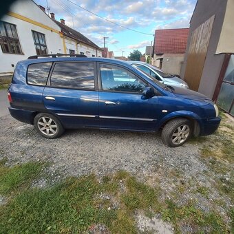 Kia carens - 6