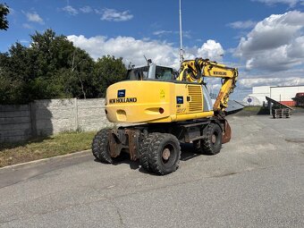 Kolové rypadlo / nakladač New Holland MH CITY - 6