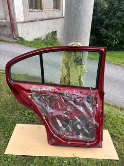 Škoda octavia 1 zadní levé dveře 9892 - 6