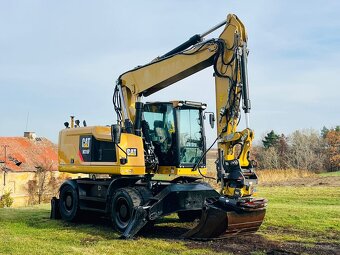 Kolové rypadlo Caterpillar M316F - 6