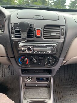 Almera 1.5 benzín 2002 - 6