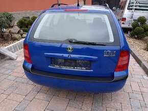 Skoda Octavia combi tour 1.6-75kw,rok 2005,org.km,stk - 6