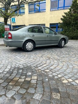Škoda octavia 1,6 75kw benzín (rok výroby 2003) - 6