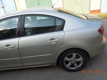 Mazda 3 sedan benzín 1.6 77kW platná STK - 6