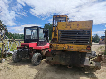 Kolový bagr DH 113 - 6