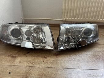 Přední světlomety Škoda Superb 1 - 6