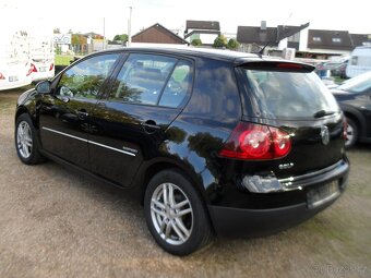 Volkswagen  Golf 1.4í - 6