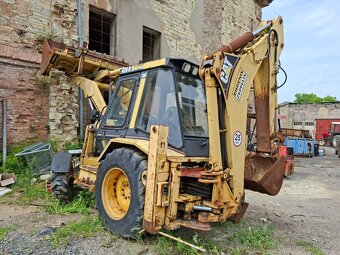 CATERPILLAR 428B 4X4 - 6