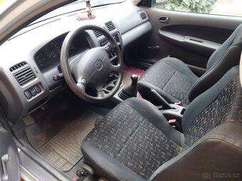 Mazda 323 BA - 6
