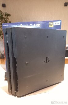 Playstation 4 Pro + 9 her - 6