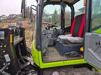 Nádherný nakladač 4x4 .vytápění. - 6