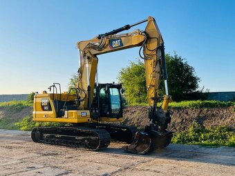 Pásové rypadlo Caterpillar 323 - 6