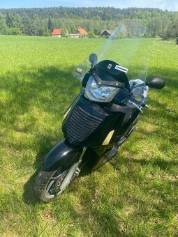 Skútru Kymco 250 - 6