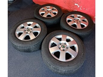 ALU disky Škoda Octavia II 5x112 R15 s letními pneu 195/65 R - 6