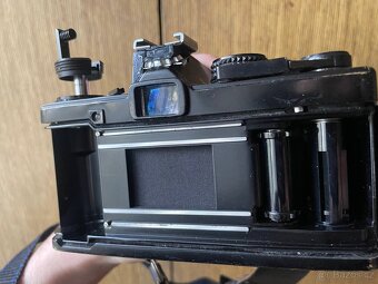 Olympus OM-2 + Tokina 2.8 24mm - 6