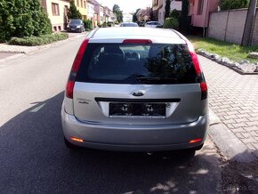Ford Fiesta 1,25i 16V 55kW, provoz 2004,po maj.r. 1936 - 6