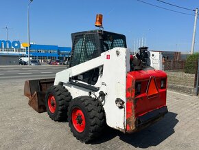 Smykový nakladač Bobcat 863, 2 lžíce uzavřená kabina, UNC - 6
