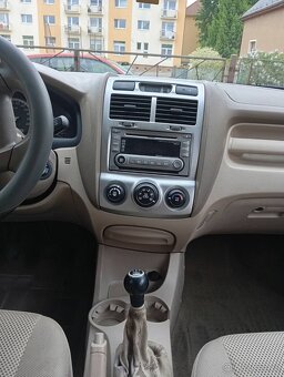Sportage - 6