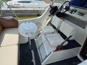 Kajutová loď Viking 22 6,7x2,4m   motor150mth  vozík  2,7t - 6