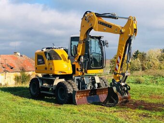 Kolové rypadlo Liebherr A910 - 6