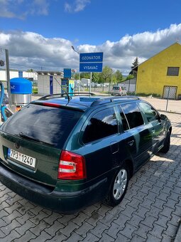Octavie 2 DSG po repasi 2.0 tdi 103 kw - 6