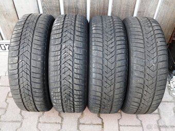 Komplet Zimní Sada Pirelli +Poklice205/60/16 ET 48 5X112 - 6